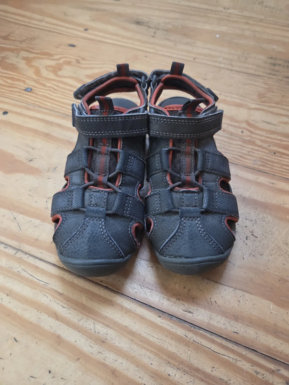 Kids Closed-Toe Sandals in Black with Orange Accents